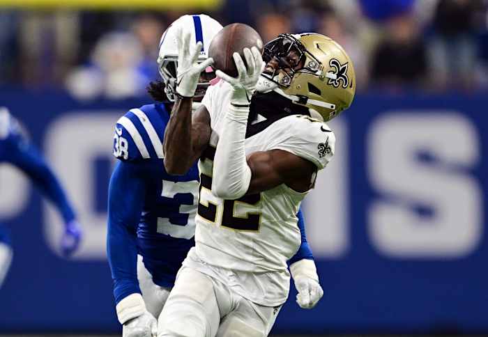 Oct 29, 2023; Indianapolis, Indiana, USA; New Orleans Saints wide receiver Rashid Shaheed (22) catches a long pass in front of Indianapolis Colts cornerback Tony Brown (38) during the second half at Lucas Oil Stadium.